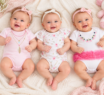 Pink 3 pack bodysuits (0- 9 Months) 